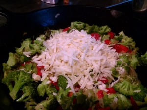 broccoli pie in progress with cheddar