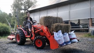 chloe driving tractor