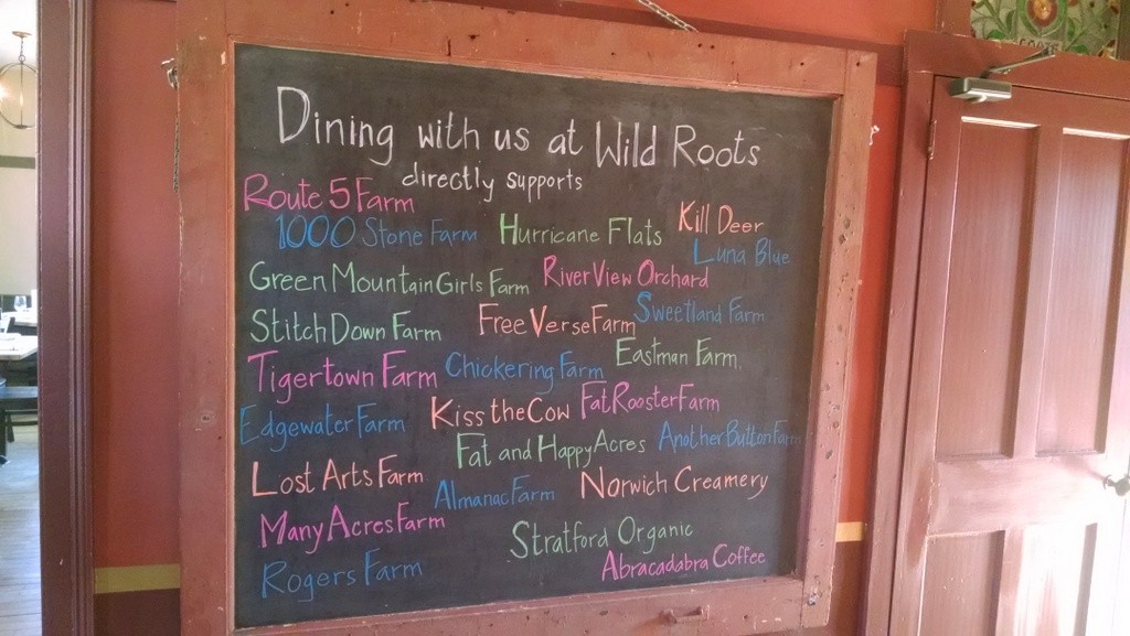 wild roots farm sign restaurant